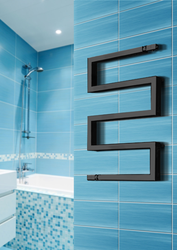 Black heated towel rail in the bathroom design