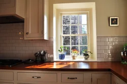 Countertop with a window in the kitchen photo in the house