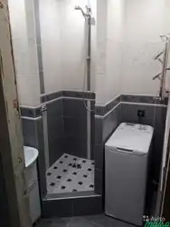 Photo of a tiled shower in a small bathroom