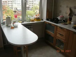 Table in a small kitchen design photo Khrushchev