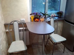 Table in a small kitchen design photo Khrushchev