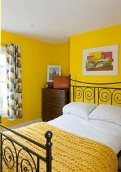 Bedroom with yellow wallpaper photo