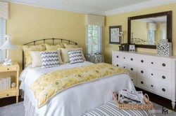 Bedroom with yellow wallpaper photo