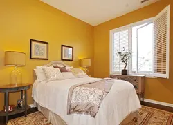 Bedroom with yellow wallpaper photo