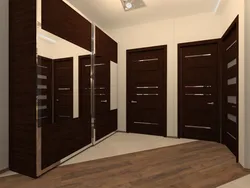 Built-in compartment doors in the hallway photo