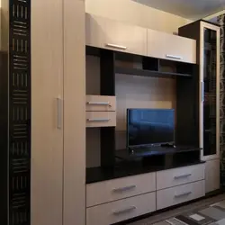 Wall In The Living Room With A Wardrobe For Clothes And Linen Photo