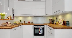Гӯшаи ошхона сафед бо акс countertop чӯбӣ дар дохили