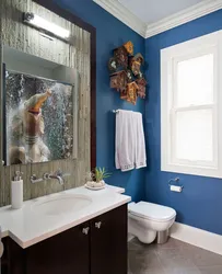Blue wall in the bathroom interior
