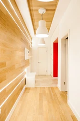 Photo of laminate on the wall in the apartment corridor