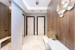 Photo of laminate on the wall in the apartment corridor