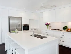 White dining table in the kitchen interior