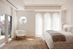 Ceiling curtains in the bedroom interior