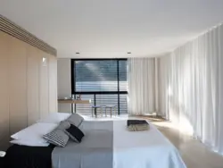 Ceiling curtains in the bedroom interior