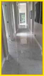 White tiles on the hallway floor photo