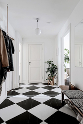 White tiles on the hallway floor photo