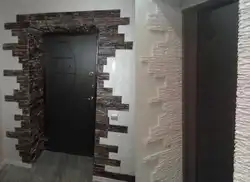 Door in the hallway made of stone photo