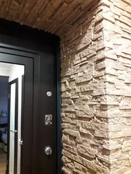 Door in the hallway made of stone photo