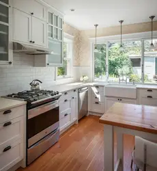 Photo of a bright kitchen with a window in the house