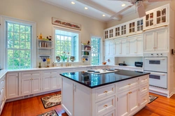 Photo of a bright kitchen with a window in the house
