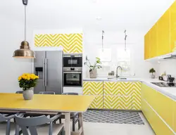 Design of a room with a kitchen in gray tones