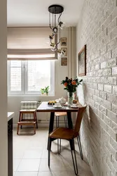 How to decorate a wall in the kitchen near the table photo