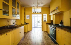 What colors does yellow go with in the kitchen interior?