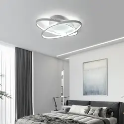 Modern lamps in the bedroom interior photo
