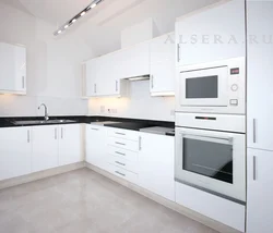 Kitchen With White Appliances In The Interior Photo