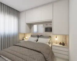 Small bedroom with bed and wardrobe photo