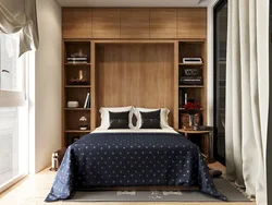 Small bedroom with bed and wardrobe photo