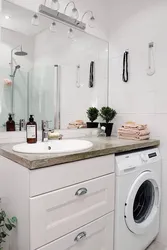 Design washing machine under the sink in the bathroom