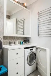 Design washing machine under the sink in the bathroom