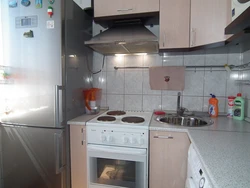 Brezhnevka kitchen design with refrigerator photo