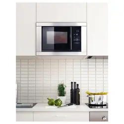 Built-in microwave oven in the kitchen photo in the interior