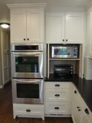 Built-in microwave oven in the kitchen photo in the interior