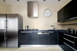 Kitchen with silver refrigerator design
