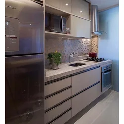Kitchen With Silver Refrigerator Design