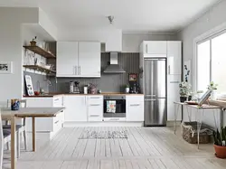 Kitchen with silver refrigerator design