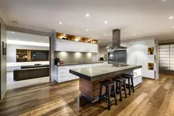 Design of a living room combined with a kitchen with an island