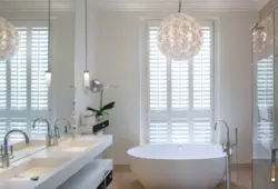 Chandelier in the bathroom photo