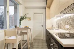 Long kitchen design with sofa