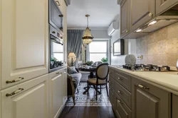 Design Of A Narrow Kitchen In A House With A Window