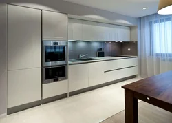 Photo of kitchen without handles, straight