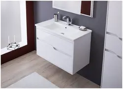 Bathtub with hanging cabinet photo