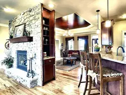 Kitchens with a fireplace in your home design photo