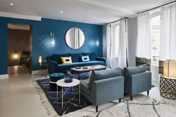 Living room with blue sofa design photo