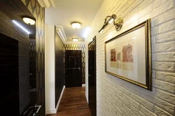 Hallway design with decorative brick and wallpaper