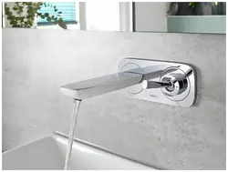 White faucets in the bathroom interior