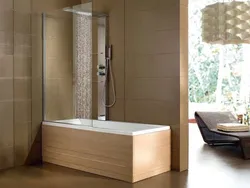Bathtub and shower cabin in one photo