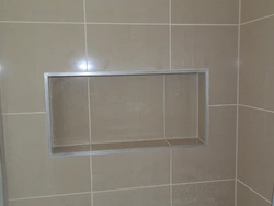 Ванна плиткаларының бұрышының фотосы